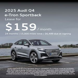 Angled profile of 2025 Audi Q4 e-tron Sportback parked